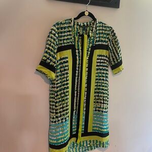 100% Silk designer dress by BCBG, gorgeous vibrant pattern, light weight mini